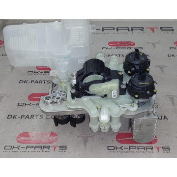 Тепловий насос 1752119-03-B для електромобіля Tesla Model X Plaid на сайті dk-parts.com.ua Тепловий насос 1752119-03-B